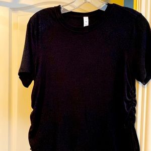 Lululemon black top with side ties size 8. Never worn